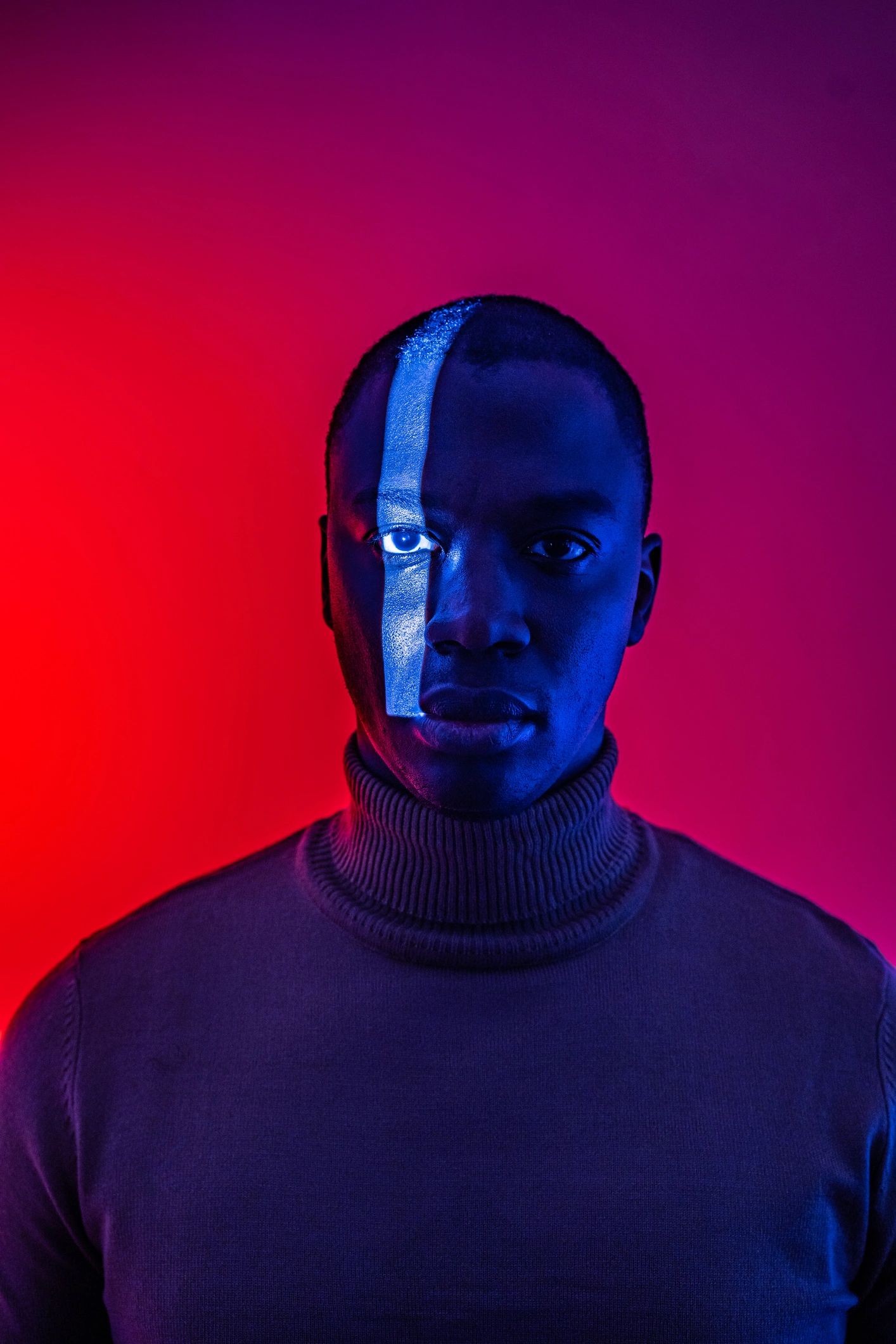 Portrait of team member in dramatic studio light